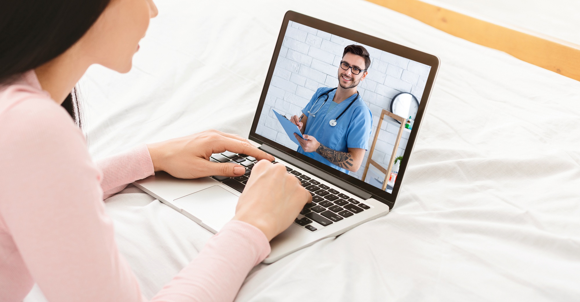 Telehealth concept. Young woman having video conference with her doctor, consulting therapist online